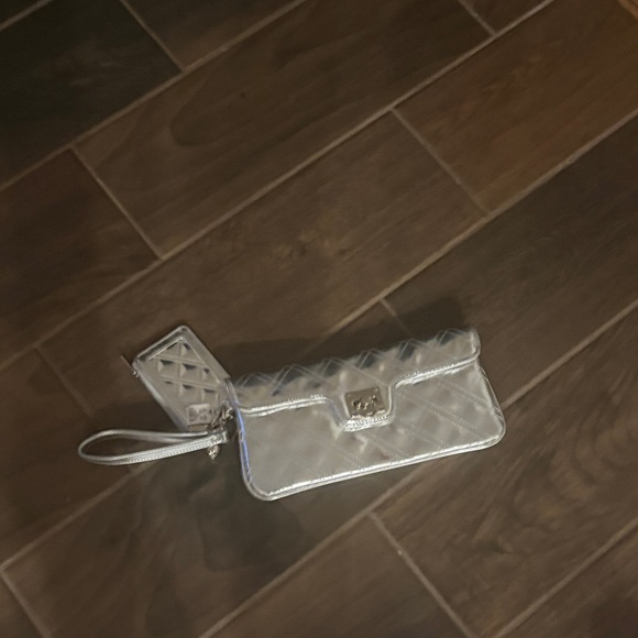 Express Handbags - Express Shiny Silver Quilted Clutch